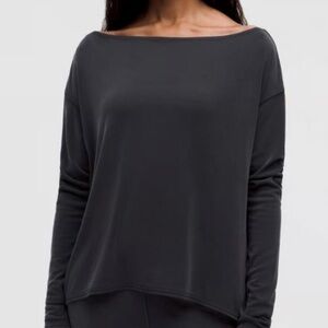 Lululemon black modal long sleeve with side slits and longer back - size 6